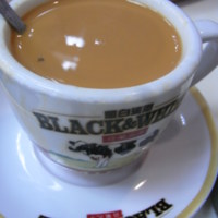 HK_Sheung_Wan_Wing_Lok_Street_Black_&_White_cup_Milktea_time_Aug-2012.JPG